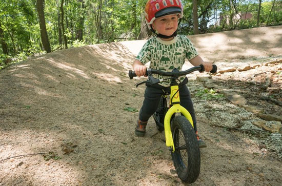 Child on a balance bike